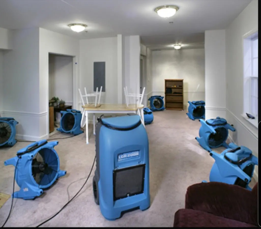 Air movers and dehumidifier setup for Water Damage Restoration in Locust Grove