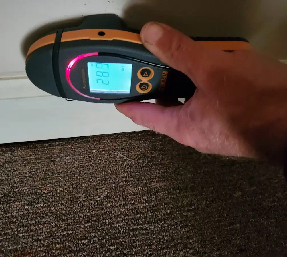 Moisture detection at baseboard during Sewage Cleanup & Sanitation in Locust Grove